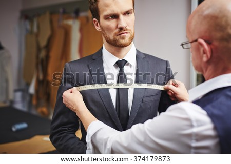 Businessman visiting tailor