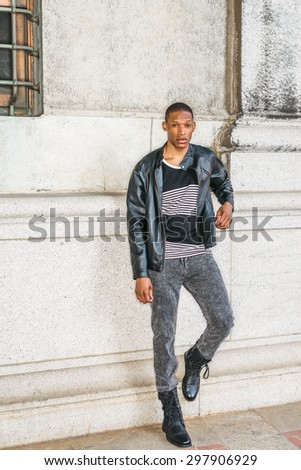Man Urban Casual Fashion Wearing Black Leather Jacket Striped Undershirt Jeans Man Urban Casual Fashion Wearing Black Leather Jacket Striped Undershirt Jeans