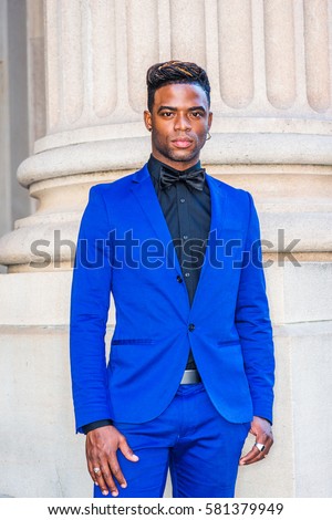 blue suit with black shirt