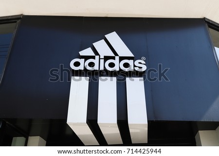 LARNACA, CYPRUS - SEPTEMBER 5 2017: Adidas logo on store in Larnaca city centre