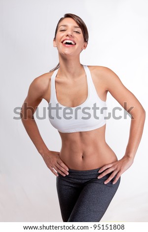 http://thumb1.shutterstock.com/display_pic_with_logo/92348/92348,1329230687,8/stock-photo-attractive-in-shape-woman-laughing-95151808.jpg