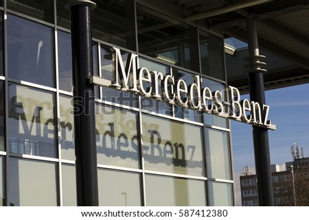 PRAGUE, CZECH REPUBLIC - FEBRUARY 25: Mercedes-Benz car logo on dealership building on February 25, 2017 in Prague, Czech republic. Daimler does deal with Uber on autonomous vehicles fleet.