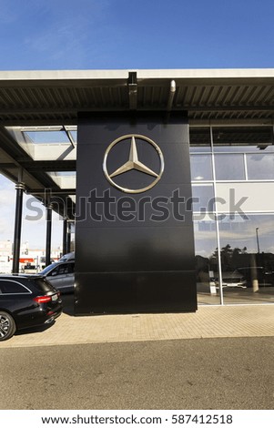 PRAGUE, CZECH REPUBLIC - FEBRUARY 25: Mercedes-Benz car logo on dealership building on February 25, 2017 in Prague, Czech republic. Daimler does deal with Uber on autonomous vehicles fleet.