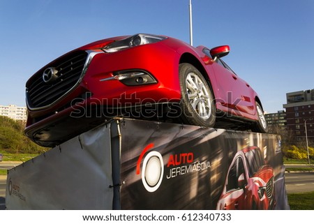 PRAGUE, CZECH REPUBLIC - MARCH 31: Mazda 3 car in front of dealership building on March 31, 2017 in Prague, Czech republic. Mazda set to launch new electric vehicle range by 2019.