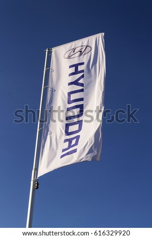 PRAGUE, CZECH REPUBLIC - MARCH 31: Hyundai company logo in front of dealership building on November 7, 2016 in Prague, Czech republic. Hyundai plans new platform for long range EVs and Genesis.