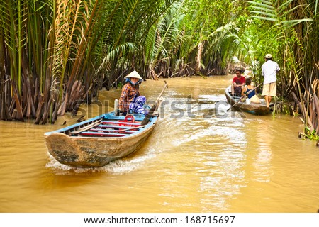 BEN TRE, VIETNAM-NOV 18, 2013: A famous tourist destination is Ben Tre village on Nov 18, 2013. in Mekong delta , Vietnam. Mekong Delta is home of people who live along the many channels.