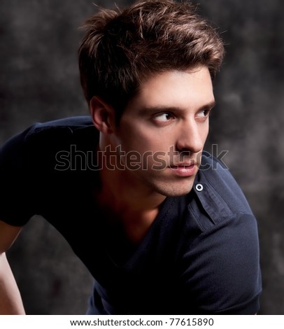 Fashion Shot of a Young Man A trendy European man dressed in contemporary cloth. He is now a professional model.