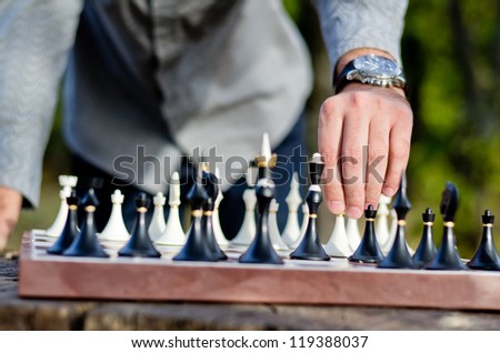 Close-up of player's hand executing his winning move