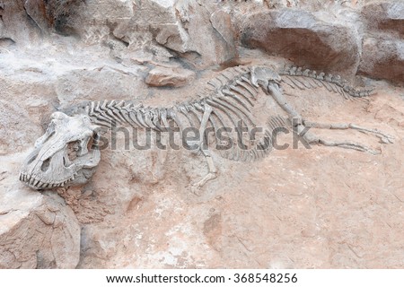 dinosaur with stone head