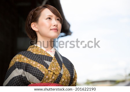 https://thumb1.shutterstock.com/display_pic_with_logo/947665/201622190/stock-photo-attractive-asian-woman-wearing-traditional-japanese-kimono-201622190.jpg