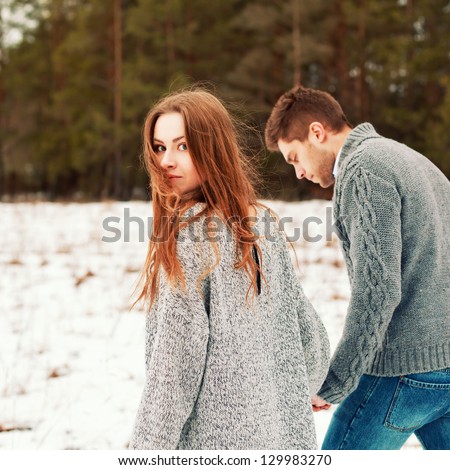 https://thumb1.shutterstock.com/display_pic_with_logo/952708/129983270/stock-photo-outdoor-happy-couple-in-love-posing-in-cold-winter-weather-young-boy-and-girl-having-fun-outdoor-129983270.jpg