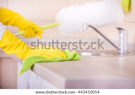 Kitchen Counter Close Up closeup woman hand cleaning stainless steel stock photo 555960268 Kitchen Counter Close Up closeup woman hand cleaning stainless steel stock photo 555960268