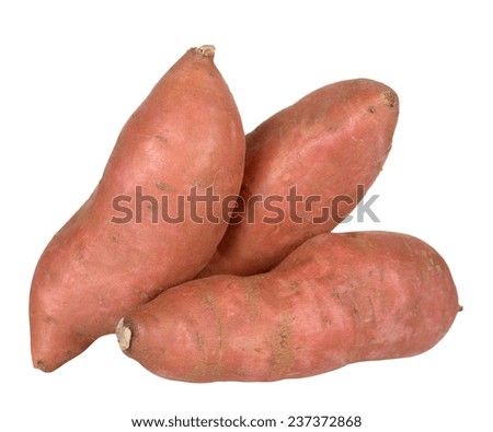 three sweet potatoes isolated on white background