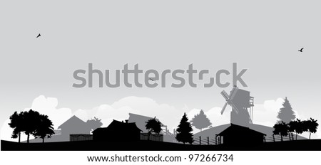 grey landscape with trees and village