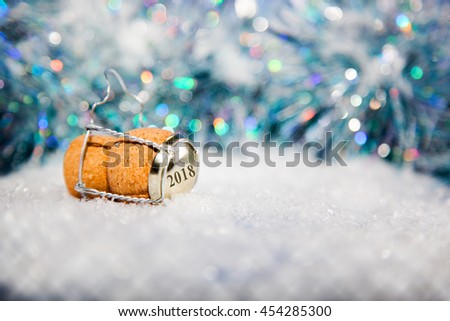 New Year's Eve/Champagne cork in the snow new year's 2018