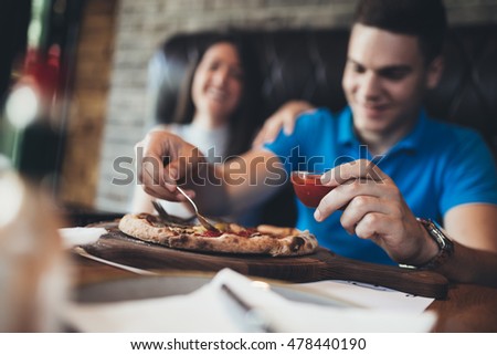 https://thumb1.shutterstock.com/display_pic_with_logo/97891/478440190/stock-photo-attractive-and-happy-young-couple-having-good-time-in-cafe-restaurant-they-are-smiling-and-eating-478440190.jpg