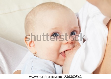 Image of cute babies breastfeeding