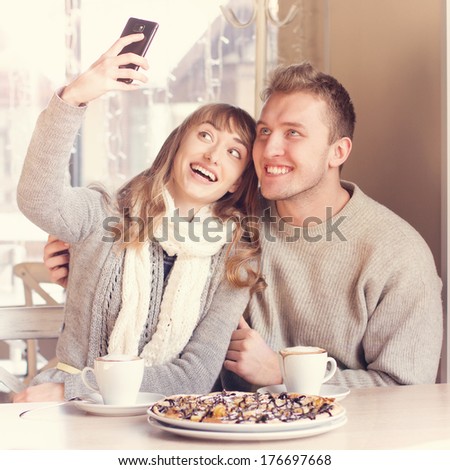 https://thumb1.shutterstock.com/display_pic_with_logo/980054/176697668/stock-photo-portrait-of-beautiful-young-couple-in-love-in-cafe-concept-of-relationship-love-story-176697668.jpg