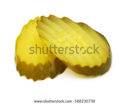 Fresh sliced green pickles isolated over white 