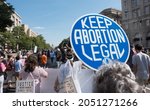Small photo of WASHINGTON, DC - OCT. 2, 2021: Women's March in Washington demanding continued access to abortion after the ban on most abortions in Texas, and looming threat to Roe v Wade in upcoming Supreme Court.