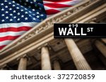 Wall Street Sign With American...
