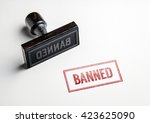 Rubber stamping that says 'Banned'.