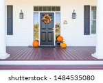 Fall Decoration Adorns Beautiful Entry Way To Home.