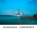 Small photo of beautiful twilight scene of Kochi chinese fishnets in Kochi, Kerala. Fort Kochin, south India