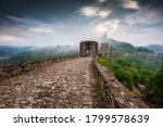 Beautiful view with spring morning mists in front of the main gate of the Tzarevetz fortress, Veliko Tarnovo, Bulgaria