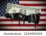 Small photo of American flag with US dollar bill dripping with crude oil showing the high cost of gas at the pump or the USA dependency on fossil fuels.