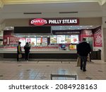 Small photo of Charley's Philly Steaks ordering counter customers wait, Saugus Massachusetts USA, December 2 2021