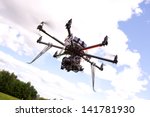 A photography multirotor helicopter with SLR camera attached