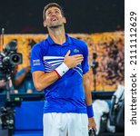 Small photo of MELBOURNE, AUSTRALIA - JANUARY 25, 2019: 14 time Grand Slam Champion Novak Djokovic celebrates victory after his semi-final match at 2019 Australian Open in Melbourne Park