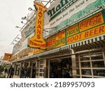 Small photo of BROOKLYN, NEW YORK - MAY 9, 2021: The Nathan's original restaurant at Coney Island, New York. The original Nathan's still exists on the same site that it did in 1916