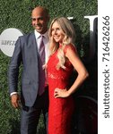 Small photo of NEW YORK - AUGUST 28, 2017: American retired professional tennis player James Blake and Emily Snider on the blue carpet before US Open 2017 opening night ceremony at Tennis Center in New York