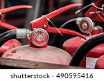 Small photo of Close up of the guage of a depressurized, old red chemical fire extinguisher