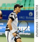Small photo of CHENNAI, INDIA - JANUARY 4, 2017: Jozef Kovalik of Slovakia plays against Marin Cilic of Croatia in a second round match at Aircel Chennai Open tournament at SDAT Tennis Stadium in Chennai.