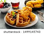 Waffles with fried chicken and maple syrup, southern comfort food