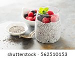 Healthy vanilla chia pudding in a glass with fresh berries