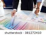 Design team choosing color palette for logo of the company