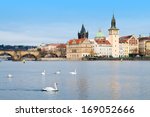 Cityscape of Prague with Old Town, the Charles Bridge and Swans on the Vltava River