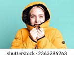 Small photo of young pretty woman wearing an anorak