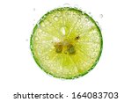 Lime Slice In Water Bubbles 