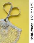 knitted string bag on a yellow... | Shutterstock . vector #1792745176