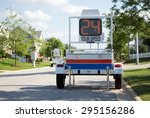 Police Mobile Radar Speed Trailer. Picture of a mobile police radar trailer with an LED sign displaying speed.