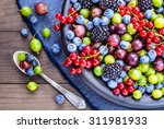 Berries fruits background. Antioxidants, detox diet, organic fruits background.