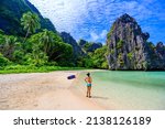 Girl at Hidden Beach in Matinloc Island, El Nido, Palawan, Philippines - Tour C route - Paradise lagoon and beach in tropical scenery