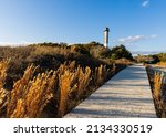 Small photo of The Sand Dunes of Station 18 Beach and Sullivan's Island Lighthouse, Sullivan's Island, South Carolina, USA