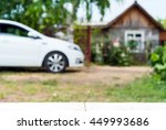new car parked outside next to... | Shutterstock . vector #449993686