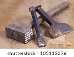 A Hammer With Two Chisels